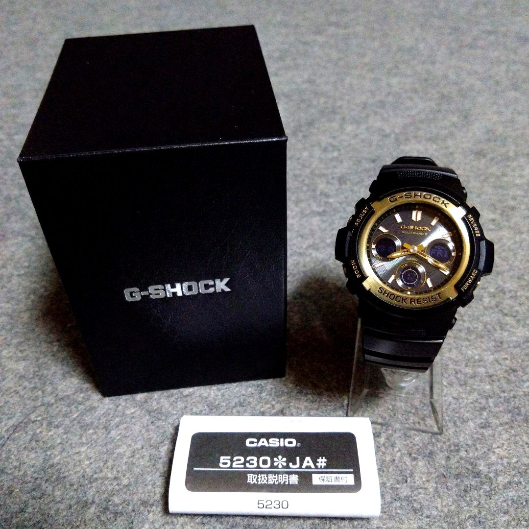 Casio G-Shock Tough Solar AWG-M100SBG-1AJF black and gold watch with silicon rubber band and black dial