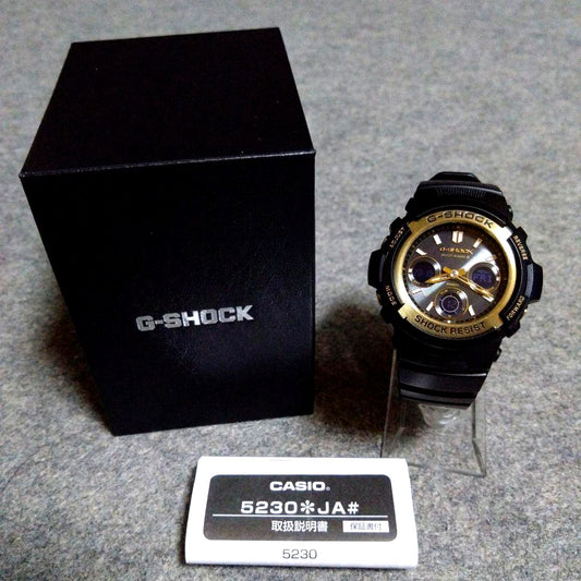 Casio G-Shock Tough Solar AWG-M100SBG-1AJF black and gold watch with silicon rubber band and black dial