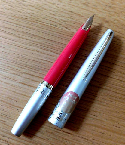 Pilot fountain pen with short fine 14K gold nib and gold beige and cherry red body