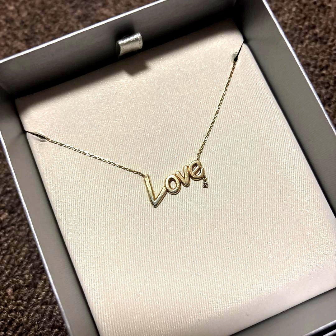 Agat K10 LOVE Necklace with a pointed 0.01 carat diamond and adjustable two-stage chain