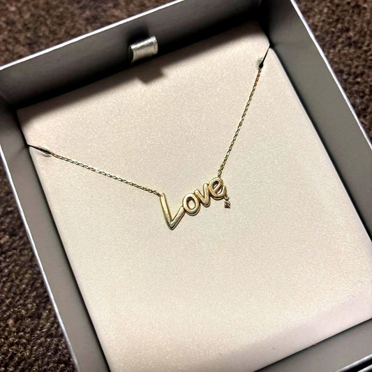 Agat K10 LOVE Necklace with a pointed 0.01 carat diamond and adjustable two-stage chain
