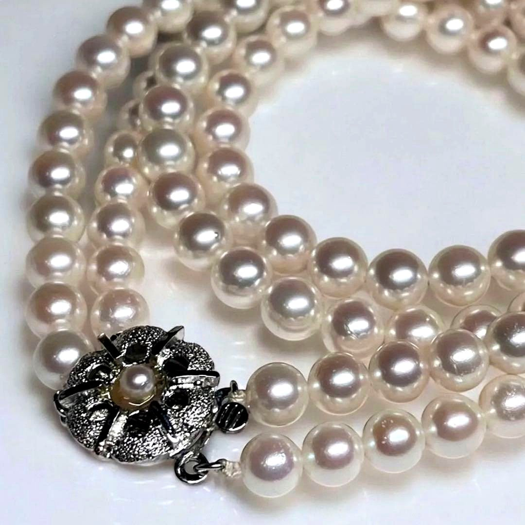 Akoya pearl 2-strand necklace with 5.8-6.5mm pearls and silver clasp on white background