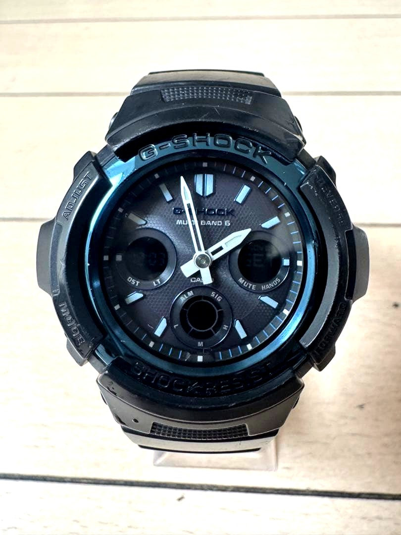 Casio G-Shock AWG-M100A-1AJF black radio solar watch with scratches and cracks on body only