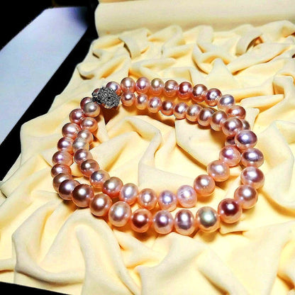 Akoya pink genuine pearl baroque necklace with silver stamp featuring 7.7mm-9.9mm pearls