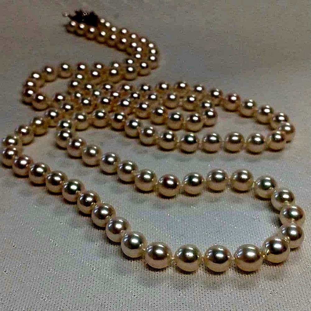 Akoya pearl long necklace with two strands of round 6.5-7 mm pearls measuring 85 cm