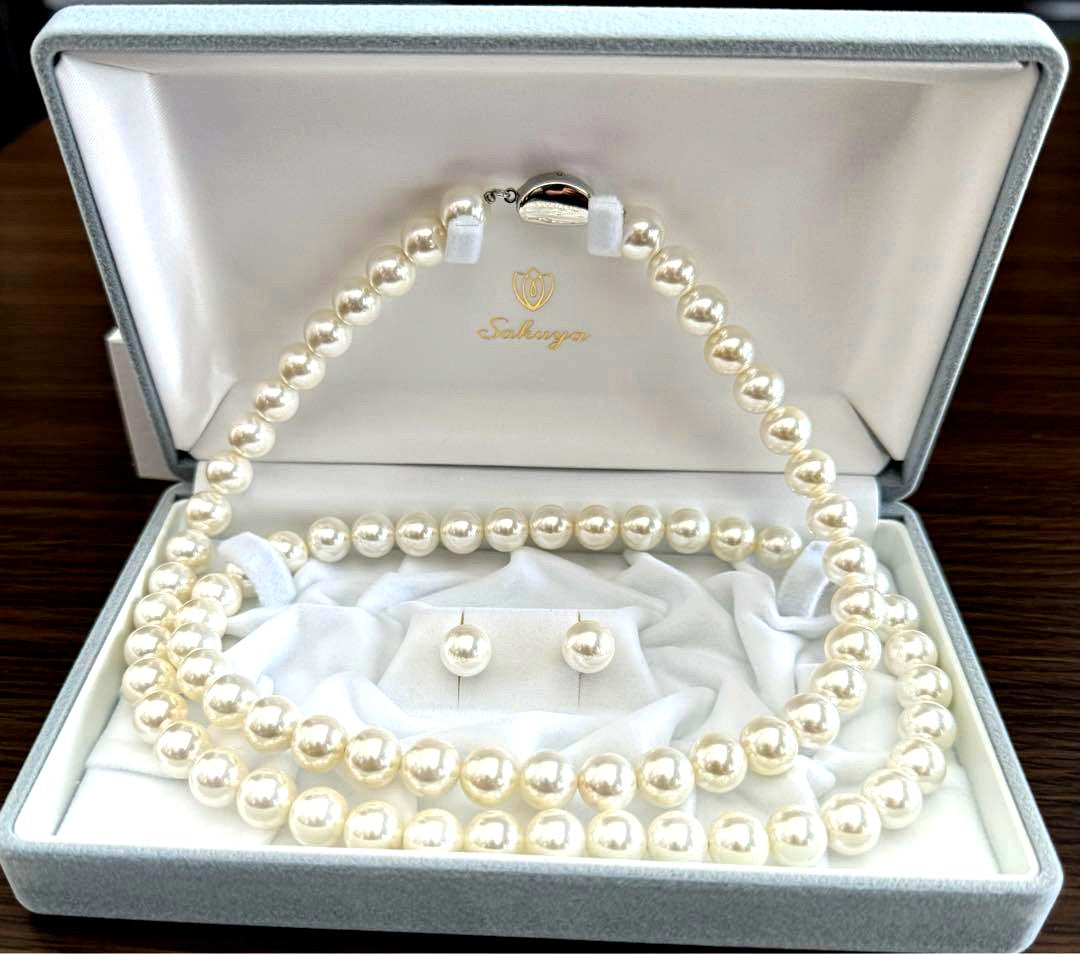 Shell pearl long necklace and matching earrings with 10mm white beads on brass rhodium plated metal