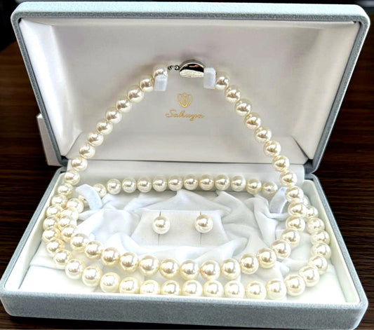 Shell pearl long necklace and matching earrings with 10mm white beads on brass rhodium plated metal