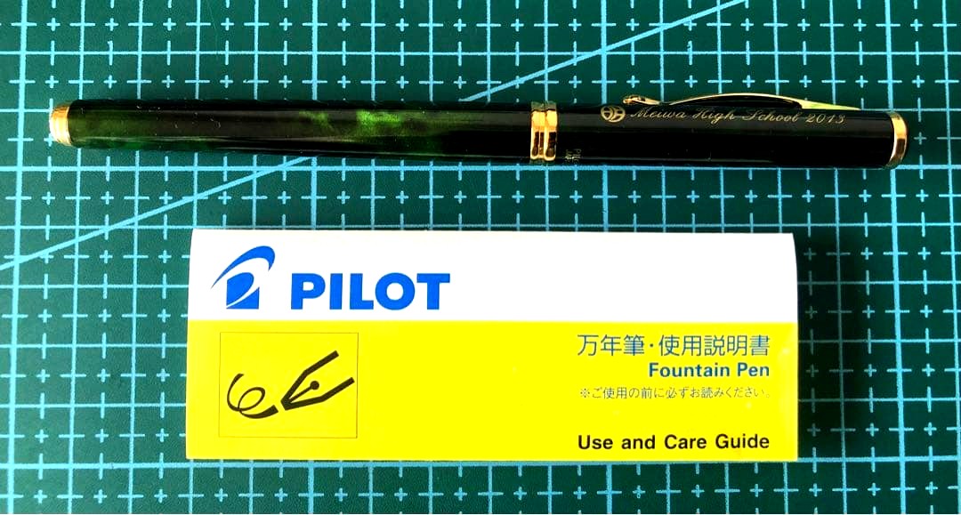 New Pilot Fountain Pen with pen cap, body, and enclosed accessories displayed on white background