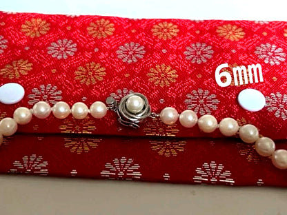 Akoya pearl necklace featuring a 6mm white pearl on a 43cm silver chain with a double lock princess clasp