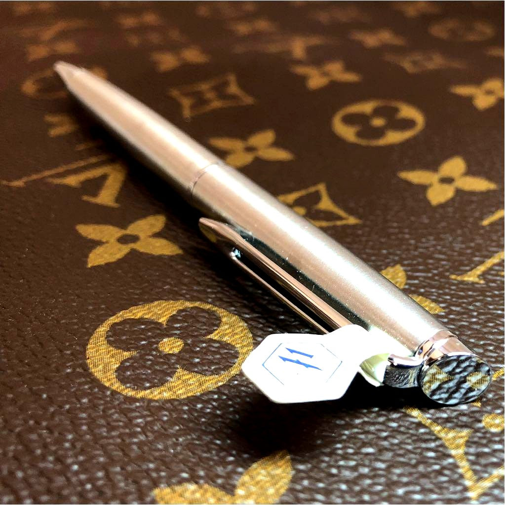 Silver Waterman Ballpoint Pen with sleek metal body and smooth writing tip