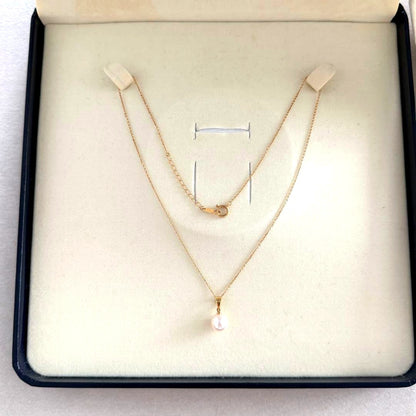 Tasaki single pearl necklace pendant with 8mm rose gold pearl set in 18K gold chain