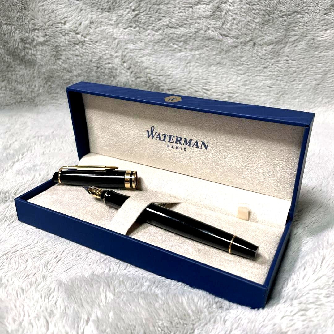 Close-up of a Waterman Fountain Pen with a sleek black body and silver accents