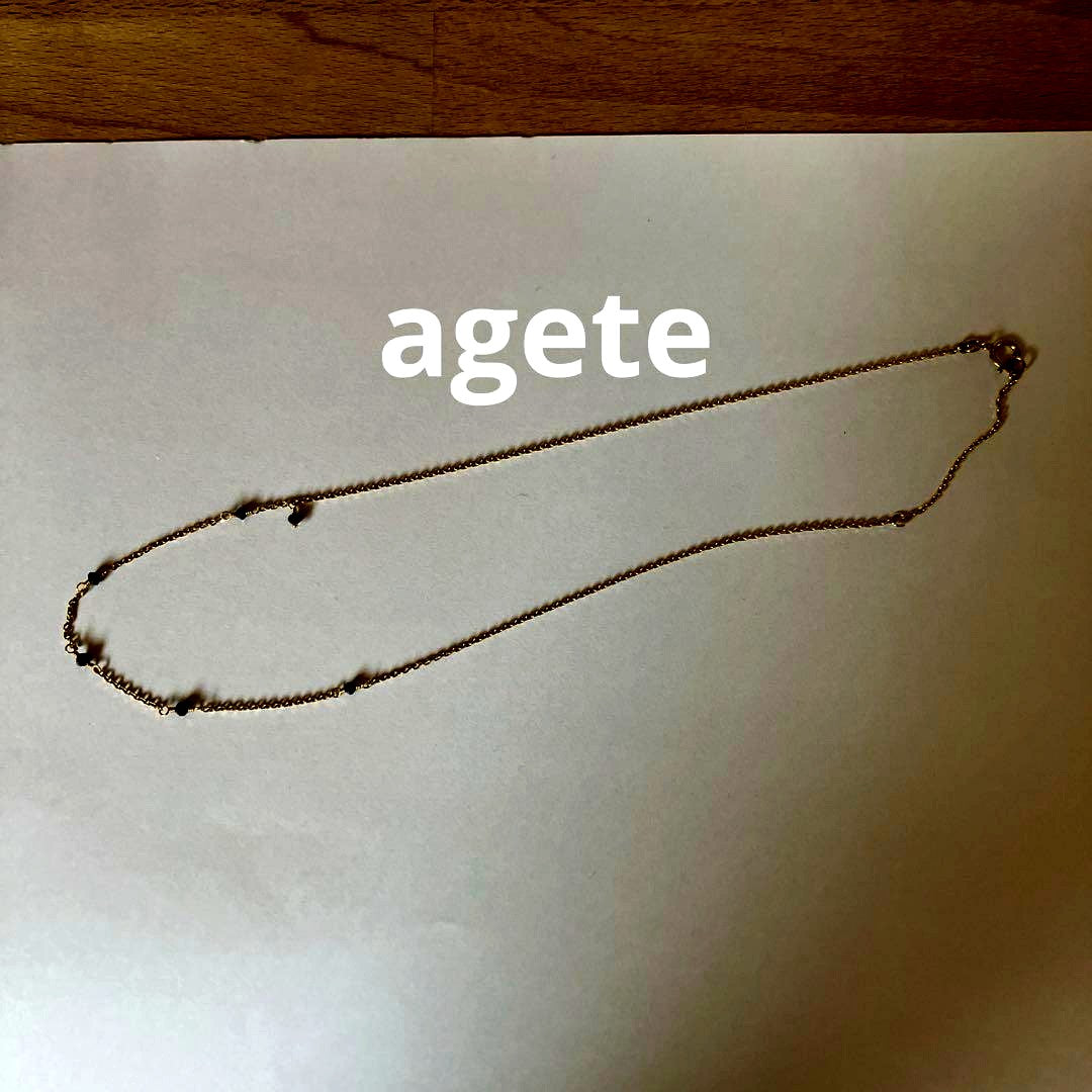 Agete black diamond necklace with delicate chain and single black diamond pendant