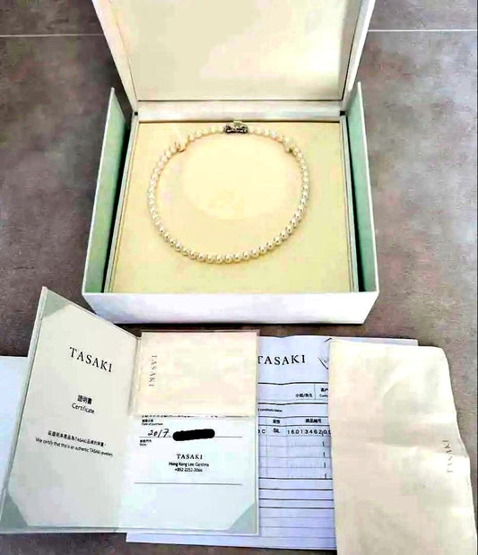 TASAKI Akoya Pearl Necklace 42cm with 7.5mm white pearls laid flat