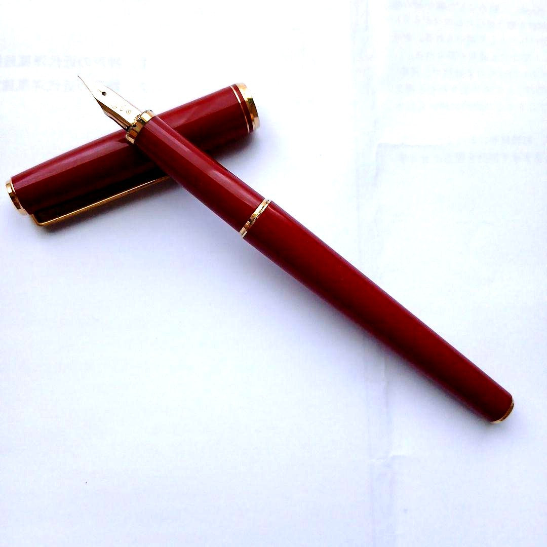 Used PILOT Fountain Pen with red body, gold trim, and gold color pen tip