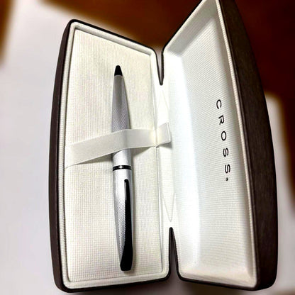 Brand new Casio Cross ballpoint pen with sleek design shown against white background