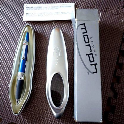 Blue Cross Morph ballpoint pen with NFL logo, metal case showing signs of age and wear