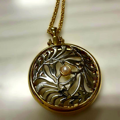 Mikimoto Pearl Loupe Necklace featuring a real pearl pendant on a delicate chain in used condition