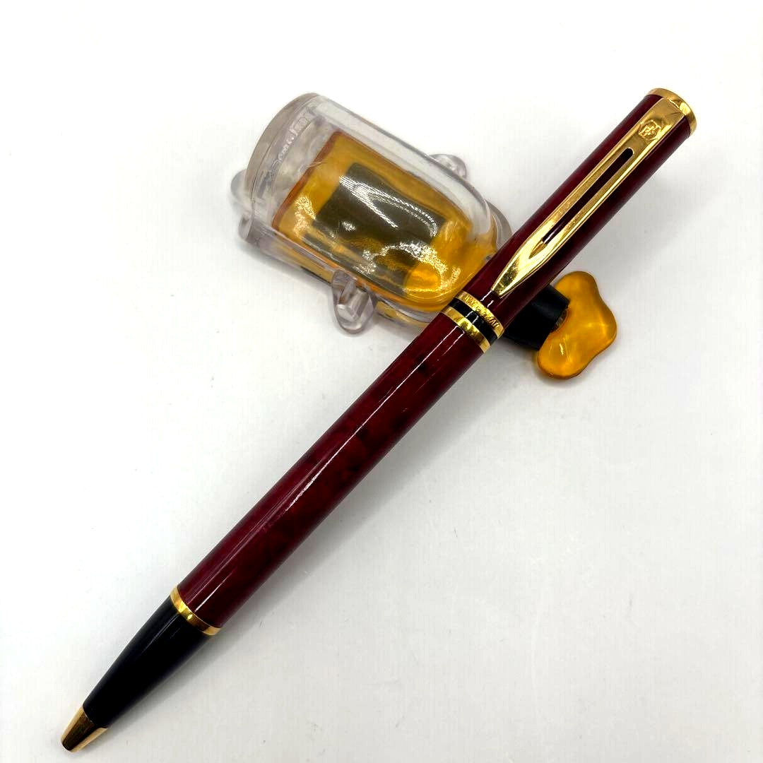 Waterman Laureat twist ballpoint pen in Bordeaux Red Marble with plastic body, used condition