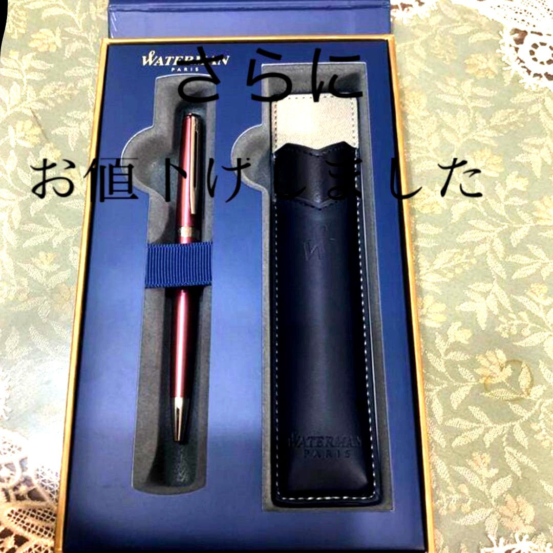Waterman pink ballpoint pen with a brown leather case and original packaging box