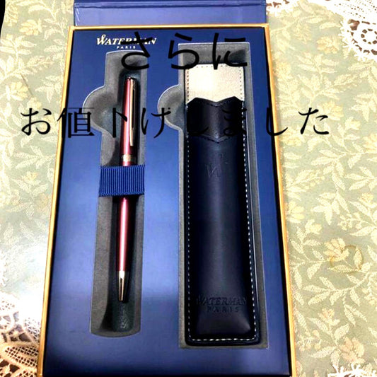 Waterman pink ballpoint pen with a brown leather case and original packaging box
