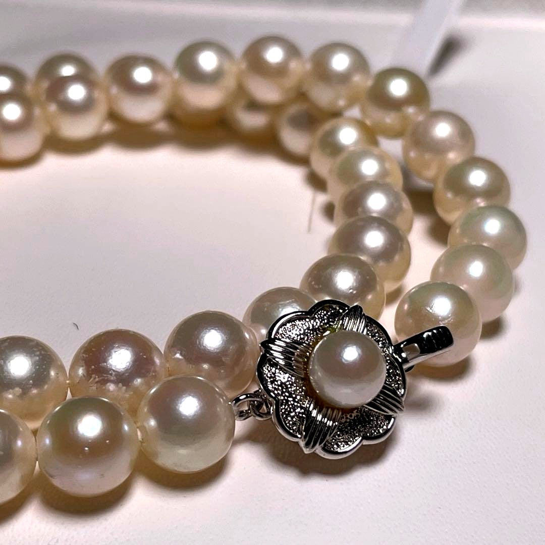 Akoya pearl necklace featuring round white pearls sized 8.5 to 8.8 mm on a 17-inch silver chain