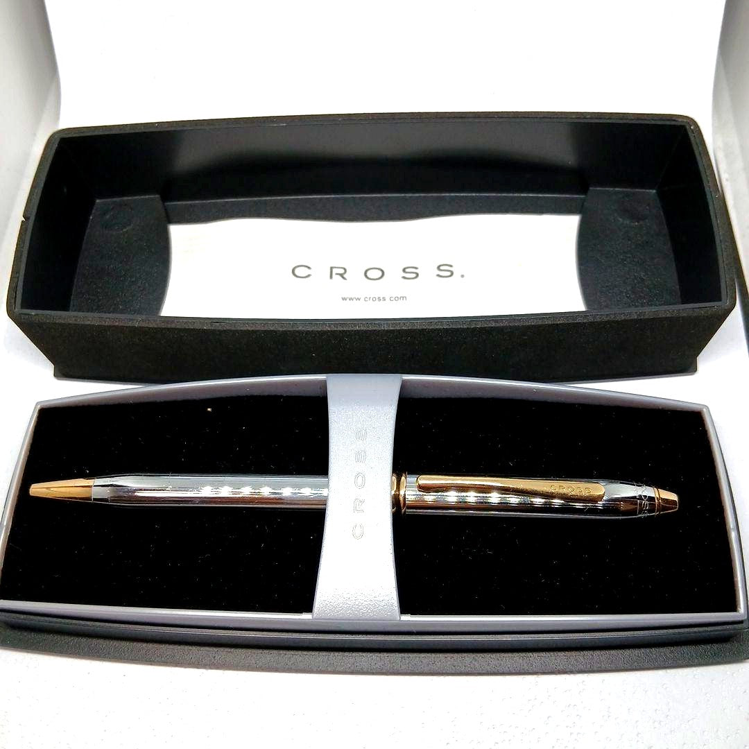 Cross ballpoint pen with silver and gold stripe design and dedicated case in silver