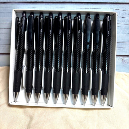 Set of 10 PILOT Opt.6 black mechanical pencils made of carbon fiber shown in a neat arrangement