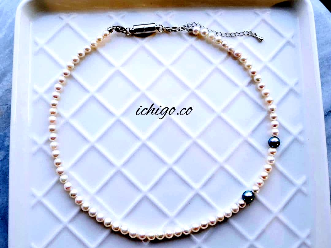 Akoya baby pearl necklace with 4mm white pearls and blue Akoya pearl necklace with 5mm deep blue pearls