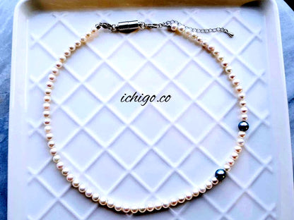 Akoya baby pearl necklace with 4mm white pearls and blue Akoya pearl necklace with 5mm deep blue pearls