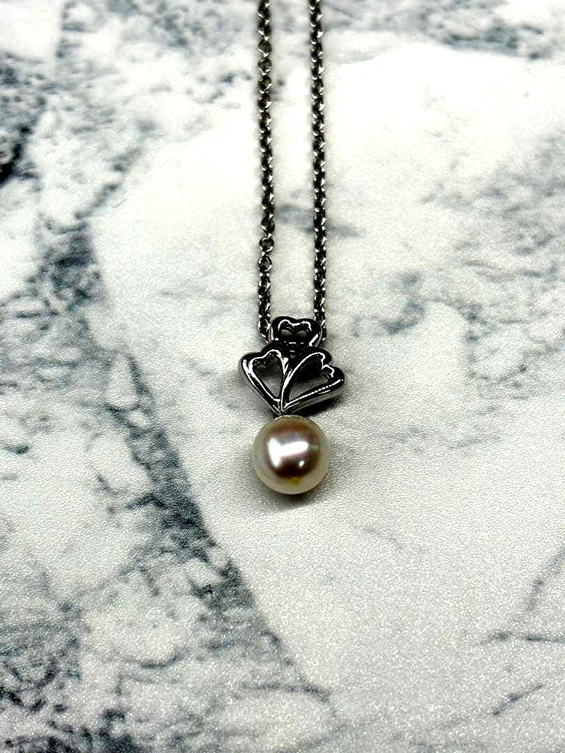 TASKA 7.1mm Akoya pearl necklace with silver mark on 40cm chain displayed on white background