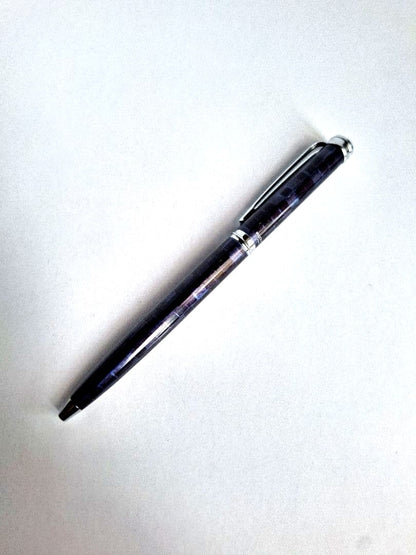 Waterman ballpoint pen with blue and black marble pattern and simple clip on metal and plastic body