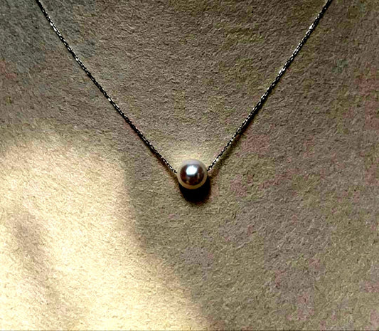 Untouched Pt850 Akoya pearl necklace featuring 8.0 mm round pearls and platinum chain