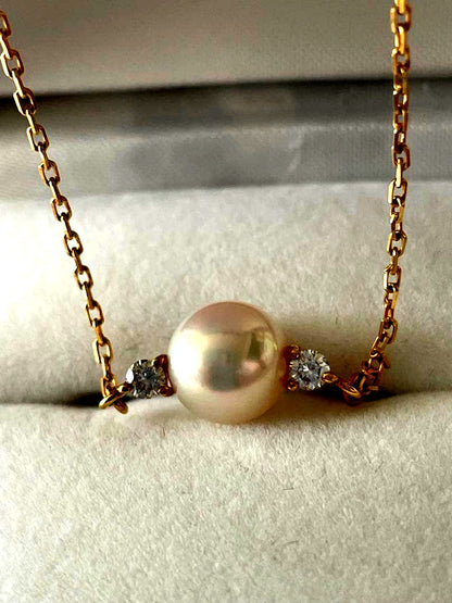 Mikimoto K18 Akoya pearl necklace with 7.4mm pearls and 37cm gold chain displayed on white background