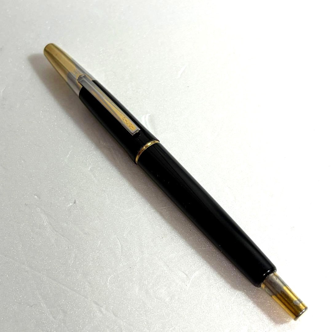 Used Pilot Capless Initial Model fountain pen with 14K gold nib, showing body crack and signs of wear