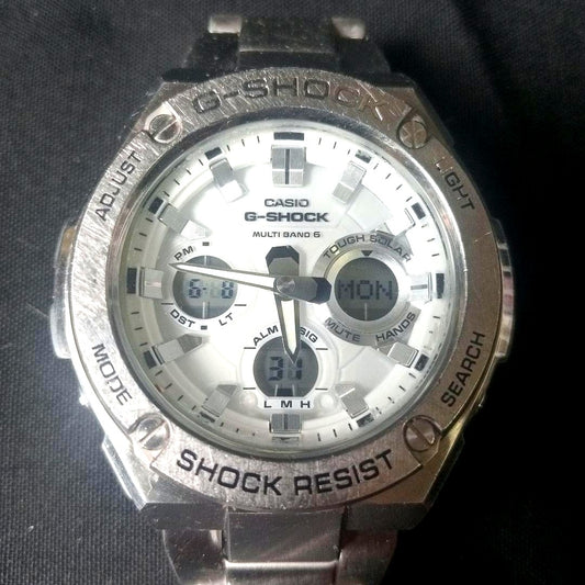 Casio G-STEEL Atomic Solar Watch with metal bezel, white dial, and stainless steel band