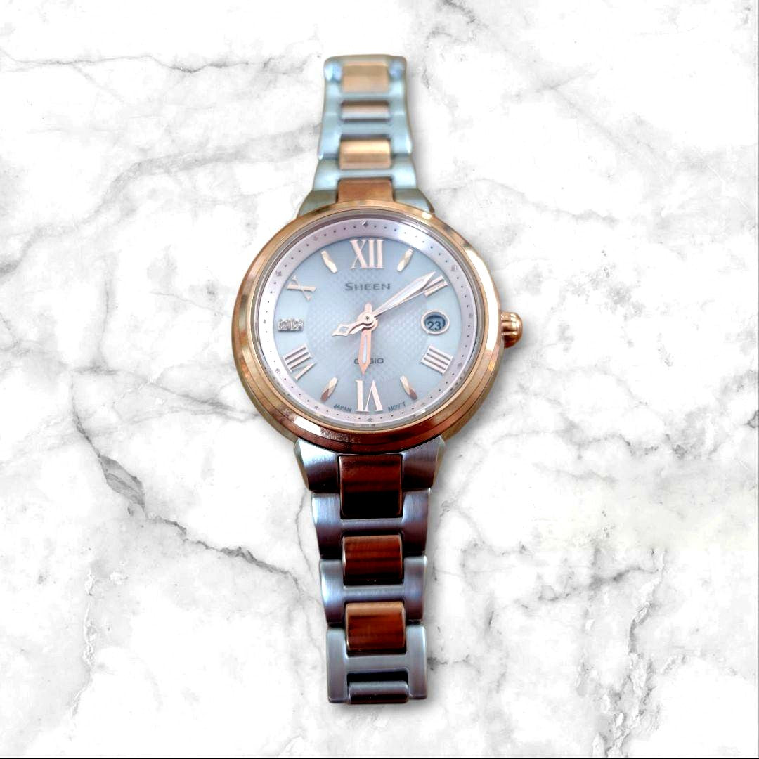 Casio Sheen ladies analog watch with silver and rose gold finish, solar powered, sapphire glass, and date display
