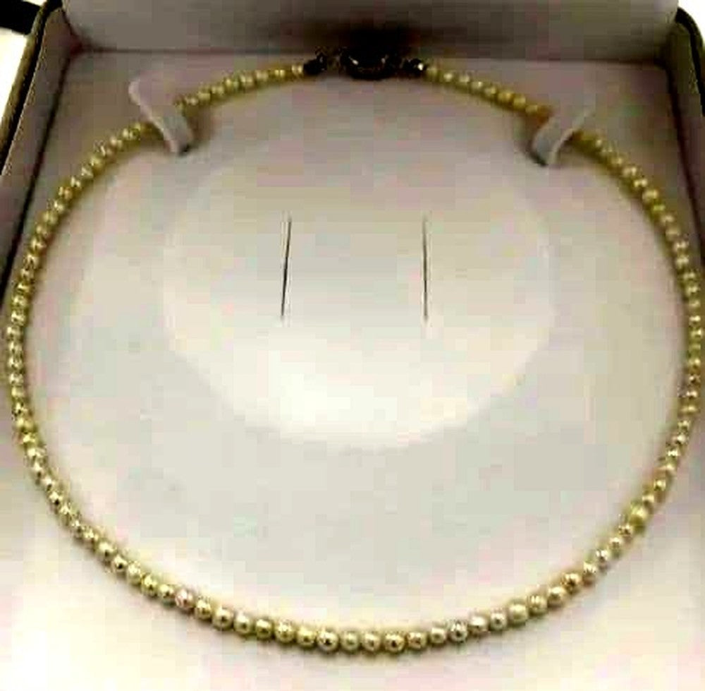 Akoya pearl baby necklace with small round pearls measuring 3.5 to 3.9mm on a 42cm chain