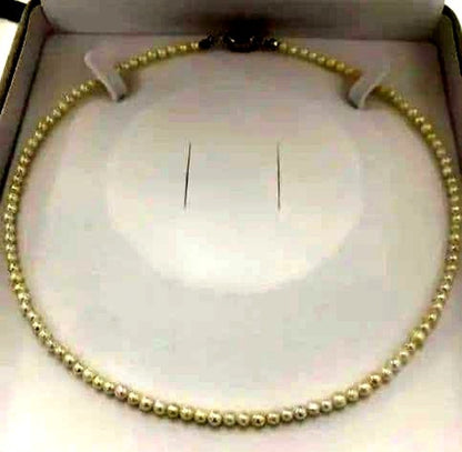 Akoya pearl baby necklace with small round pearls measuring 3.5 to 3.9mm on a 42cm chain