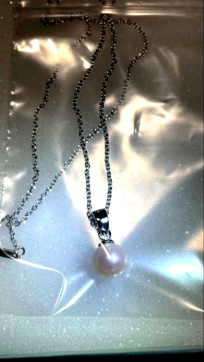 Akoya pearl silver necklace with 7mm pearls on a 40cm silver chain displayed on white background