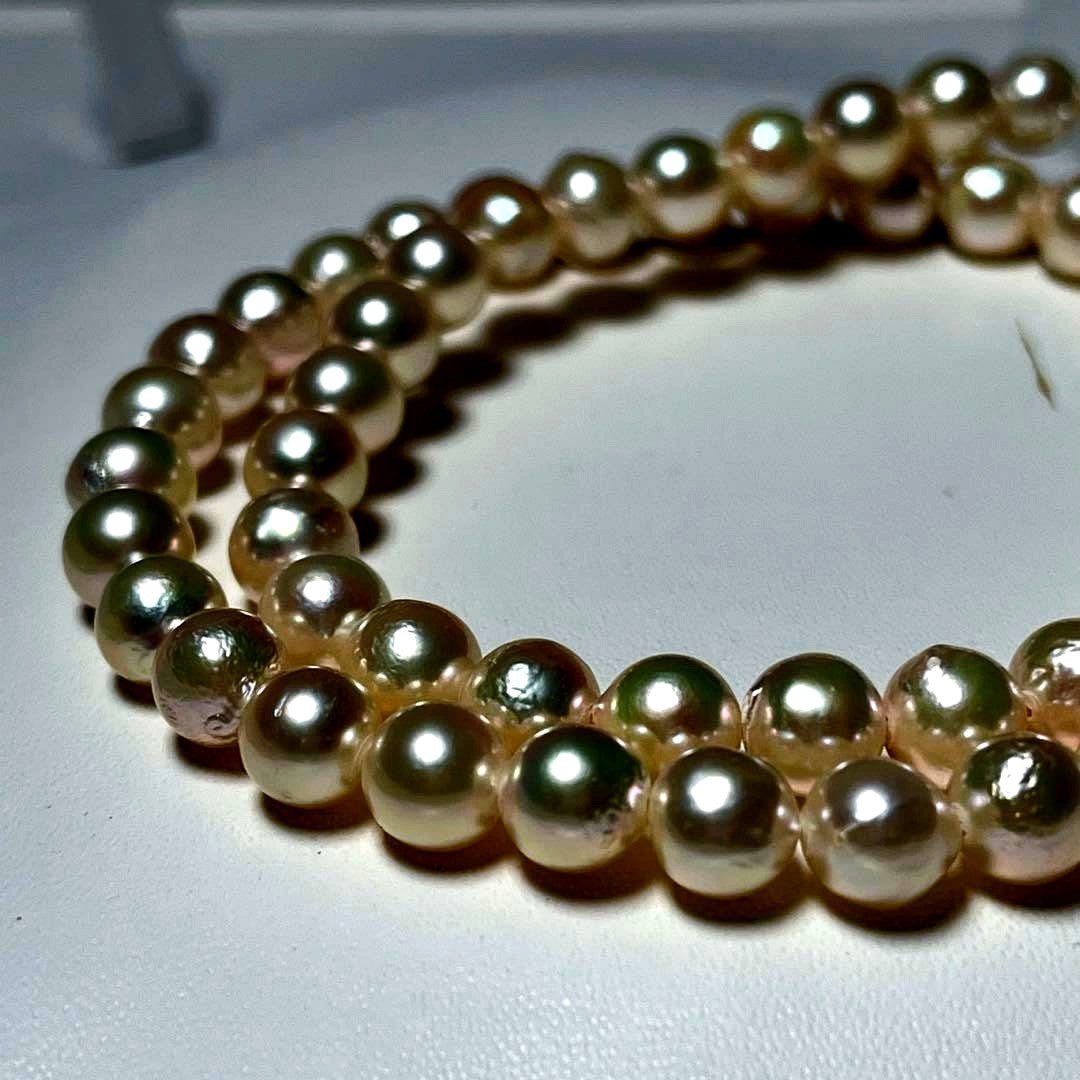 Aoya pearl necklace with 6.4-6.8mm white Akoya pearls and silver Teri wrap, 42.5 cm length