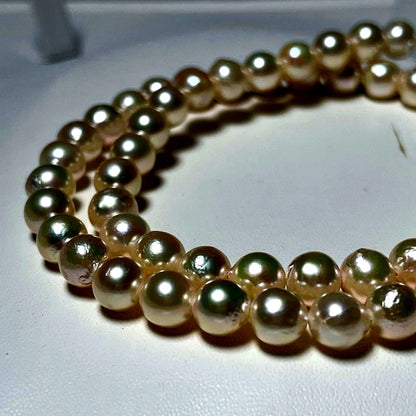 Aoya pearl necklace with 6.4-6.8mm white Akoya pearls and silver Teri wrap, 42.5 cm length