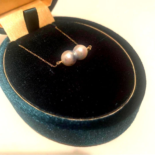 Twin Akoya pearl necklace with 10K gold chain and deep sea-inspired design