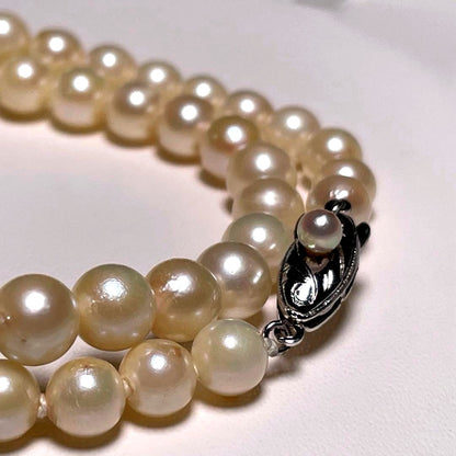 Akoya pearl necklace with 5.8-6.8mm round white pearls on a 16 inch silver chain