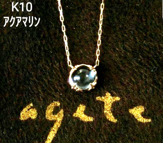 Agate Aquamarine K10 Necklace with cabochon cut pale blue aquamarine pendant on a delicate gold chain