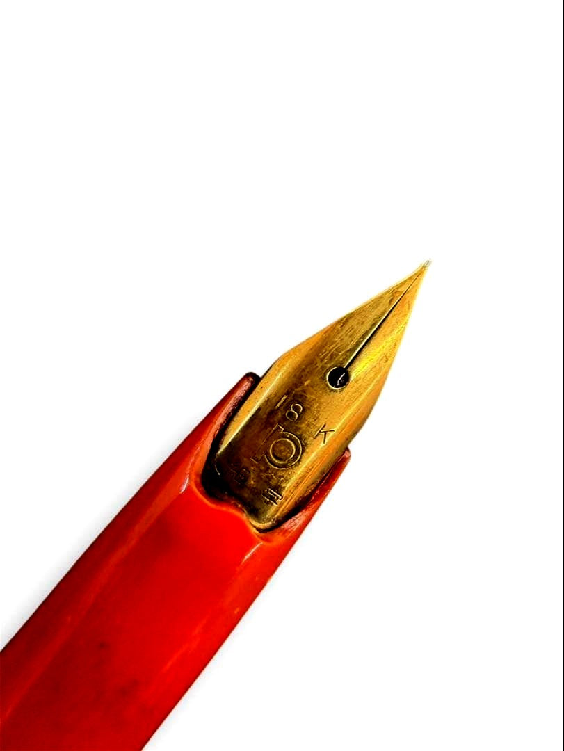 Pilot 18K gold fountain pen with a sleek design and detailed nib on a white background