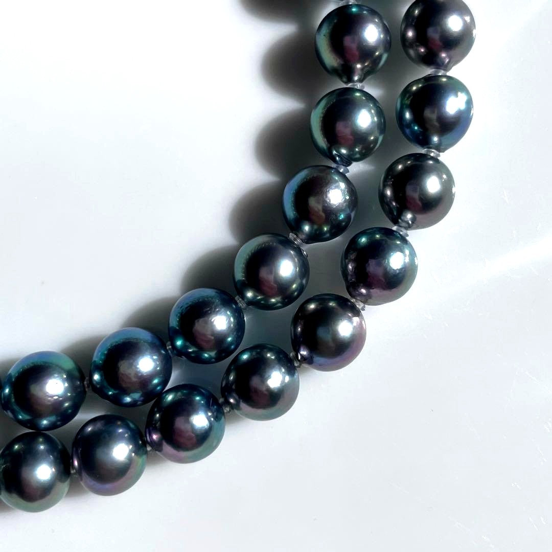 Akoya Pearl Black Necklace with 7.5-8mm pearls and silver clasp displayed on white background