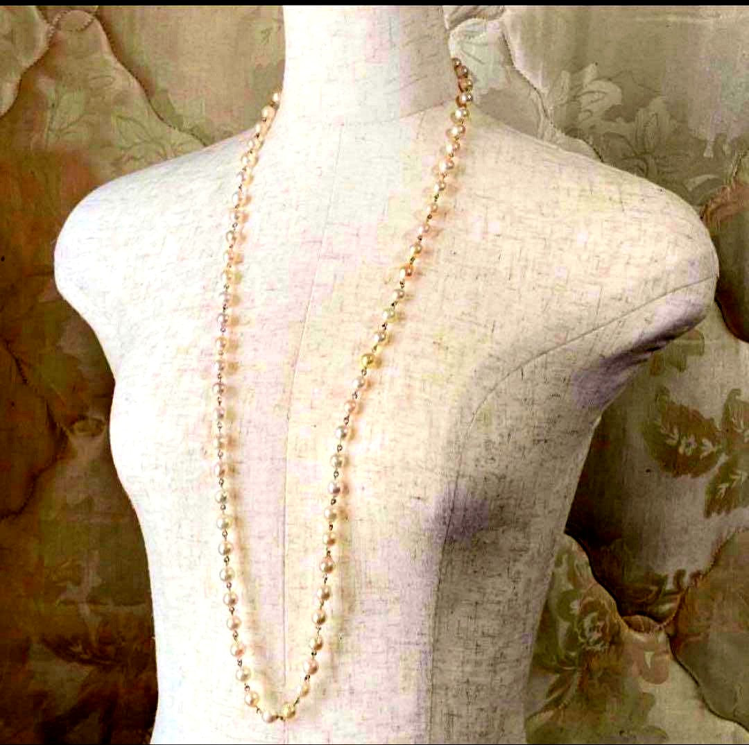 Downton Abbey style play set displayed with an 85 cm Akoya pearl long necklace of large baroque pearls