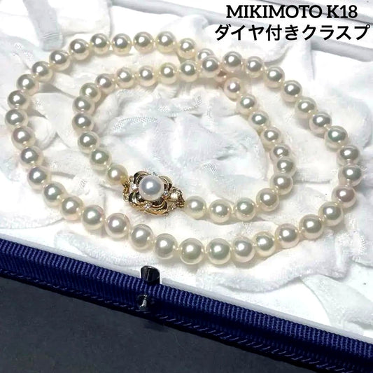 Mikimoto K18 Akoya Pearl Necklace featuring 6.5-7.0mm pearls and four diamond side stones on 44.5cm chain