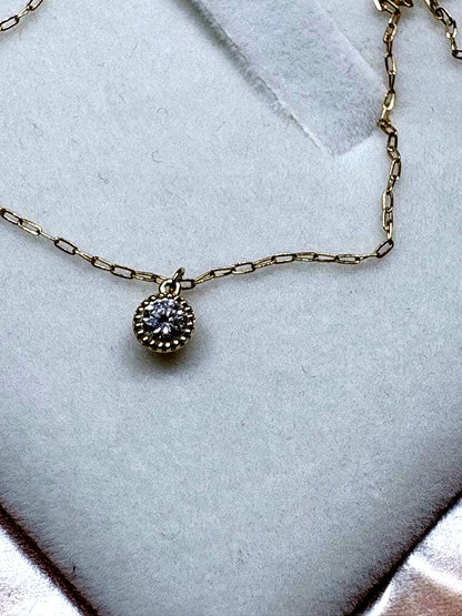 agete diamond necklace with 0.1CT carat weight crafted in K18 gold on a white background
